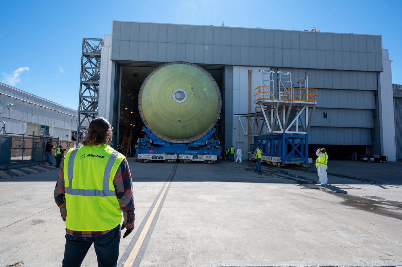 This image highlights the liquid hydrogen tank that will be used on the core stage of NASA’s Space Launch System rocket for Artemis II, the first crewed mission of NASA’s Artemis program. The tank is being built at NASA’s Michoud Assembly Facility in New Orleans. The SLS core stage is made up of five unique elements: the forward skirt, liquid oxygen tank, intertank, liquid hydrogen tank, and the engine section. The liquid hydrogen tank holds 537,000 gallons of liquid hydrogen cooled to minus 423 degrees Fahrenheit and sits between the core stage’s intertank and engine section. The liquid hydrogen hardware, along with the liquid oxygen tank, will provide propellant to the four RS-25 engines at the bottom of the cores stage to produce more than two million pounds of thrust to launch NASA’s Artemis missions to the Moon. Together with its four RS-25 engines, the rocket’s massive 212-foot-tall core stage — the largest stage NASA has ever built — and its twin solid rocket boosters will produce 8.8 million pounds of thrust to send NASA’s Orion spacecraft, astronauts and supplies beyond Earth’s orbit to the Moon and, ultimately, Mars. Offering more payload mass, volume capability and energy to speed missions through space, the SLS rocket, along with NASA’s Gateway in lunar orbit, the human landing system, and Orion spacecraft, is part of NASA’s backbone for deep space exploration and the Artemis lunar program. No other rocket can send astronauts in Orion around the Moon in a single mission.